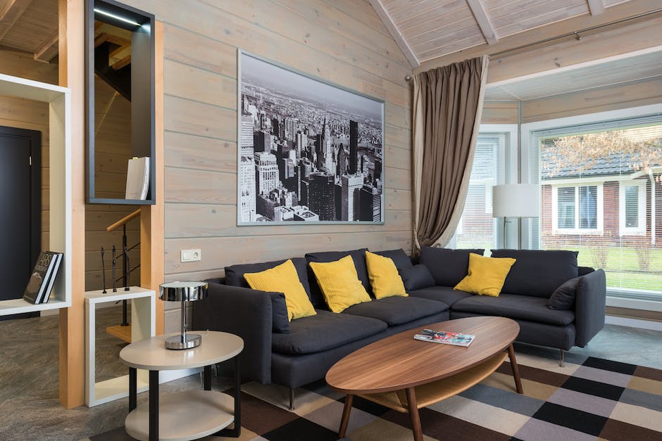 Kanapa narożna – jak wykorzystać jej zalety w swoim salonie?